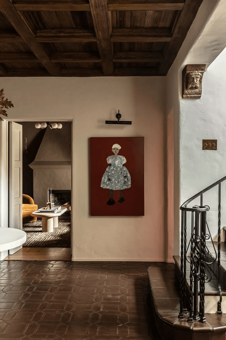 Entryway with Spanish artwork of a person