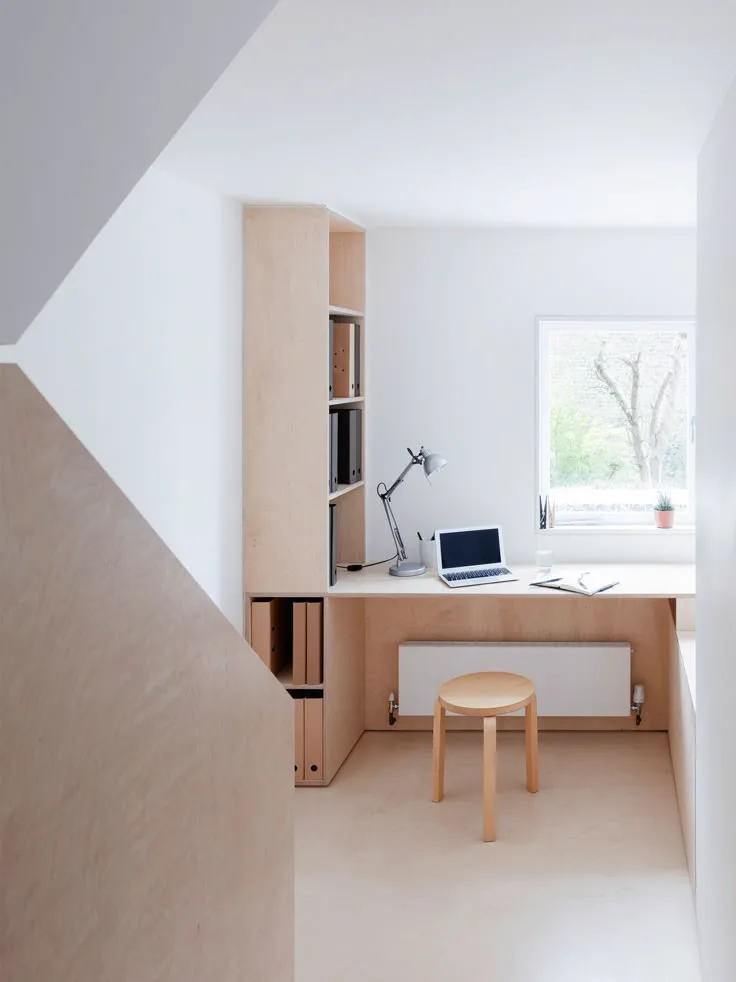 minimalist wood office design with white walls