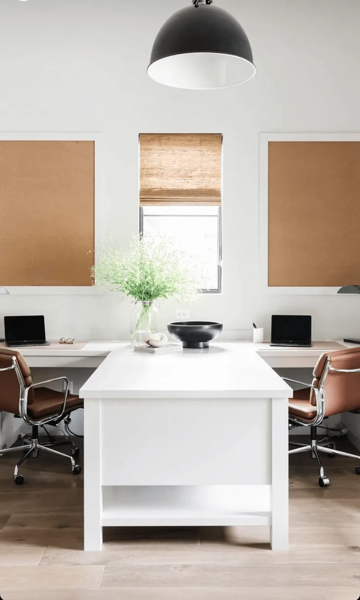 modern shared office design with his and hers chairs and sides