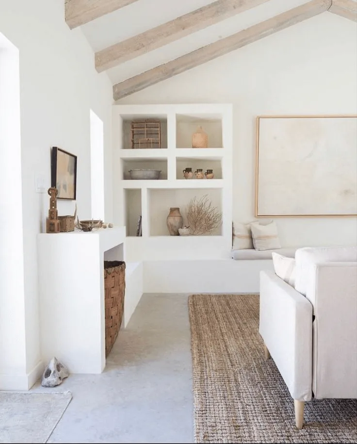 a light and bright living room in modern Spanish style, lots of white