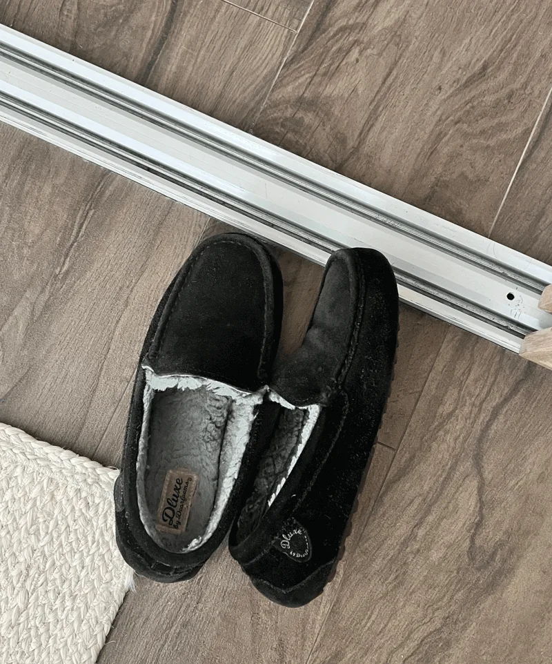 slippers on a wood floor