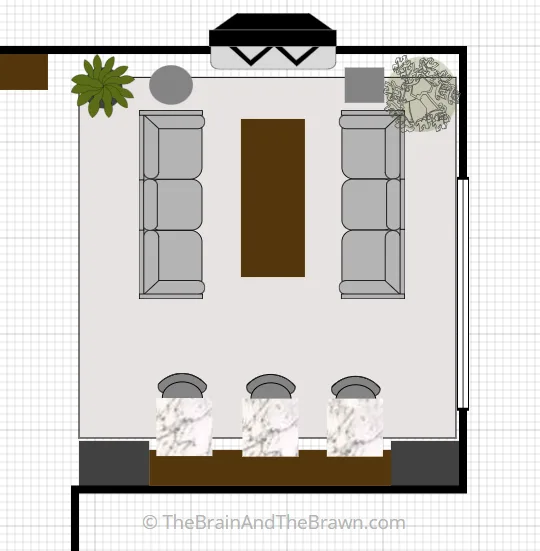 a layout showing living room furniture arrangement with a fireplace and a separate cafe sitting area