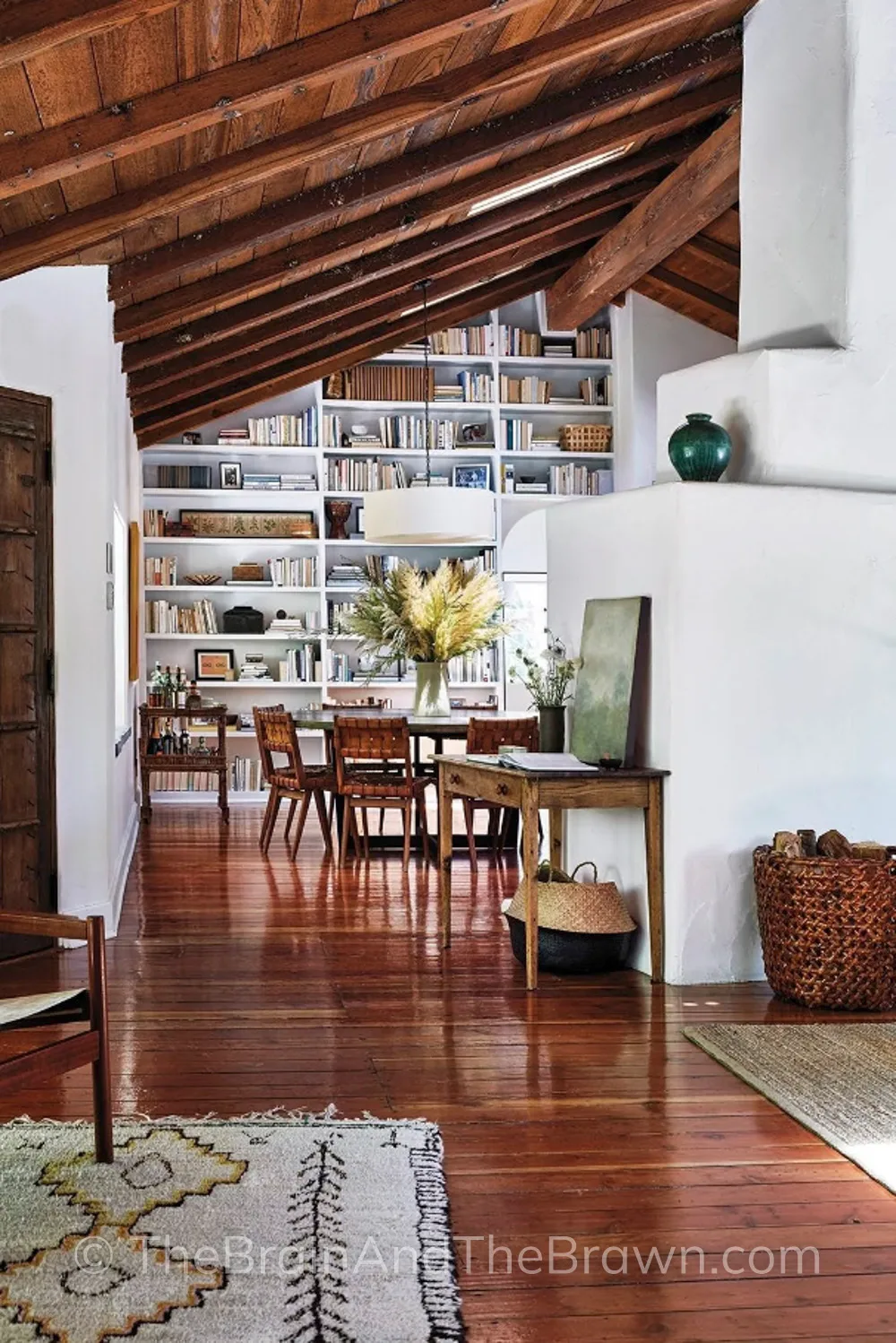 home interior with angled wall bookshelves, rustic 