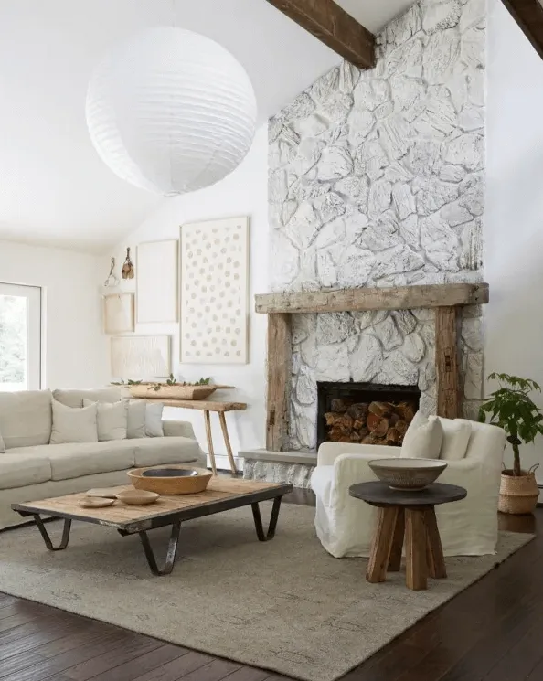 whitewashed stone fireplace idea