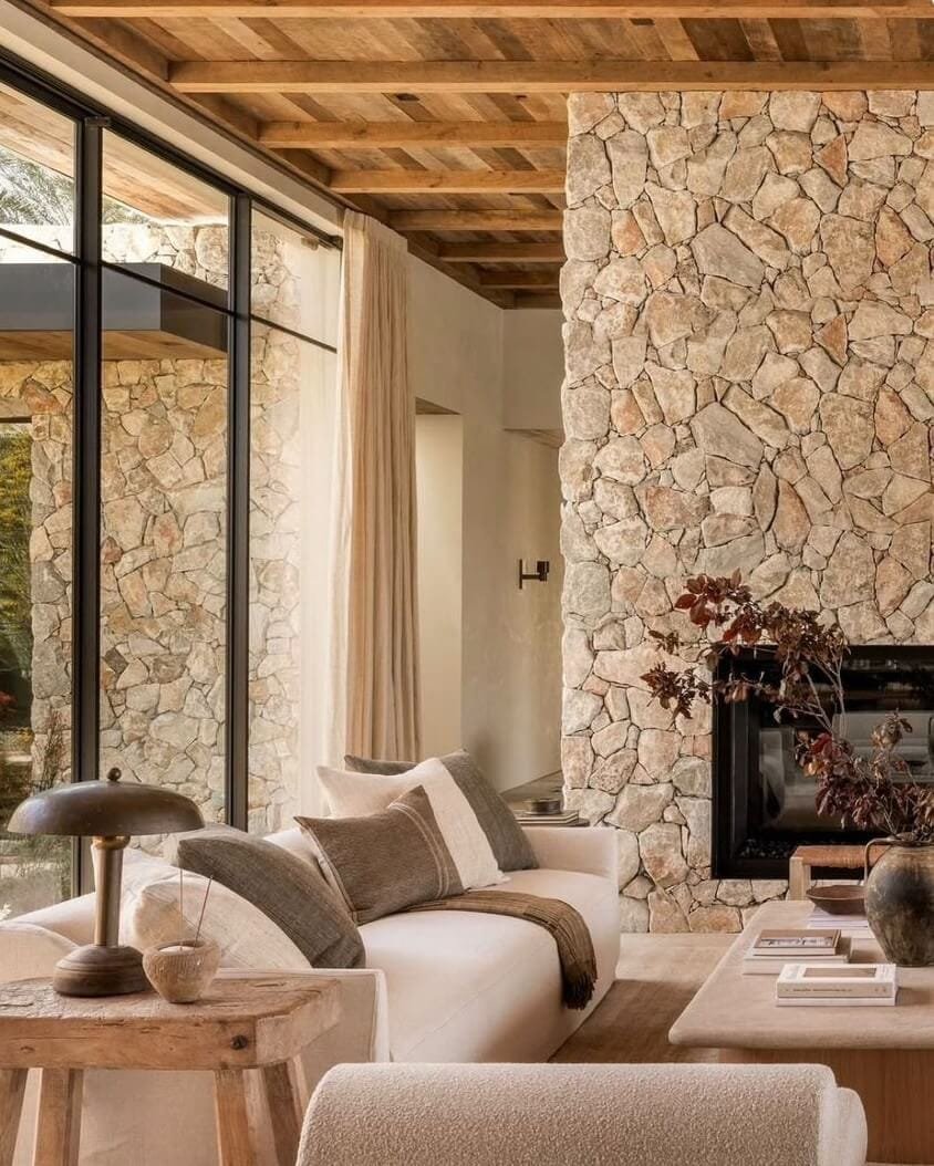 modern natural stone fireplace in living room