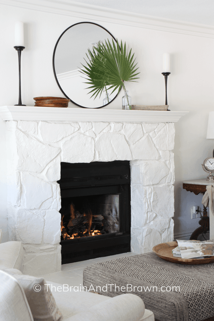 a stone fireplace idea in living room painted white