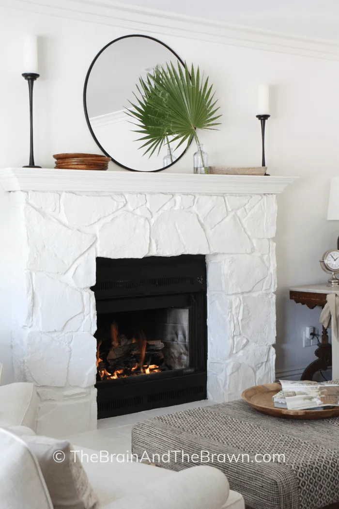 a stone fireplace idea in living room painted white